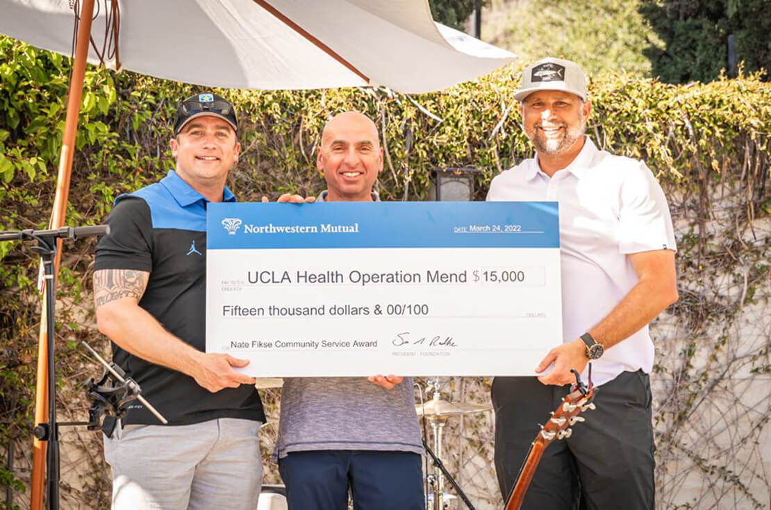 UCLA  Health Operations Mend $15,000 check presentation from March 24,2022